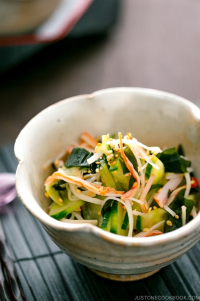 A flower shape bowl containing Japanese Cucumber Salad with Crab.