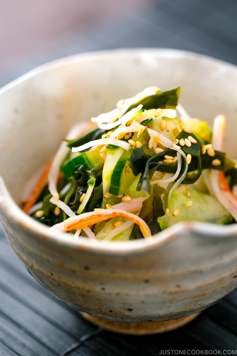 A flower shape bowl containing Japanese Cucumber Salad with Crab.