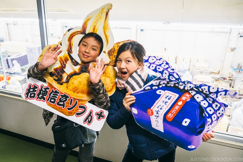 kids with Shingen Mochi signs - Yamanashi Fruit Picking and Wine Tasting | www.justonecookbook.com 