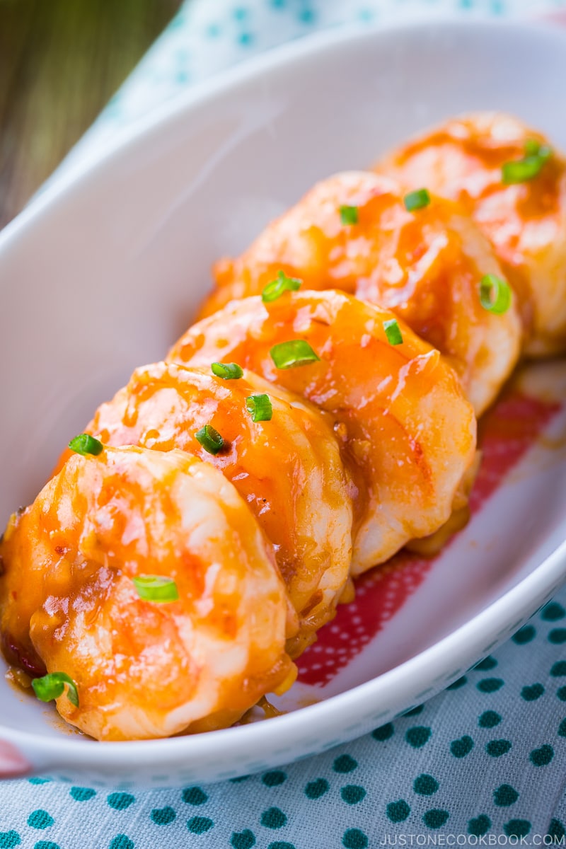 A white plate containing Spicy Shrimp Stir Fry (Ebi Chili).