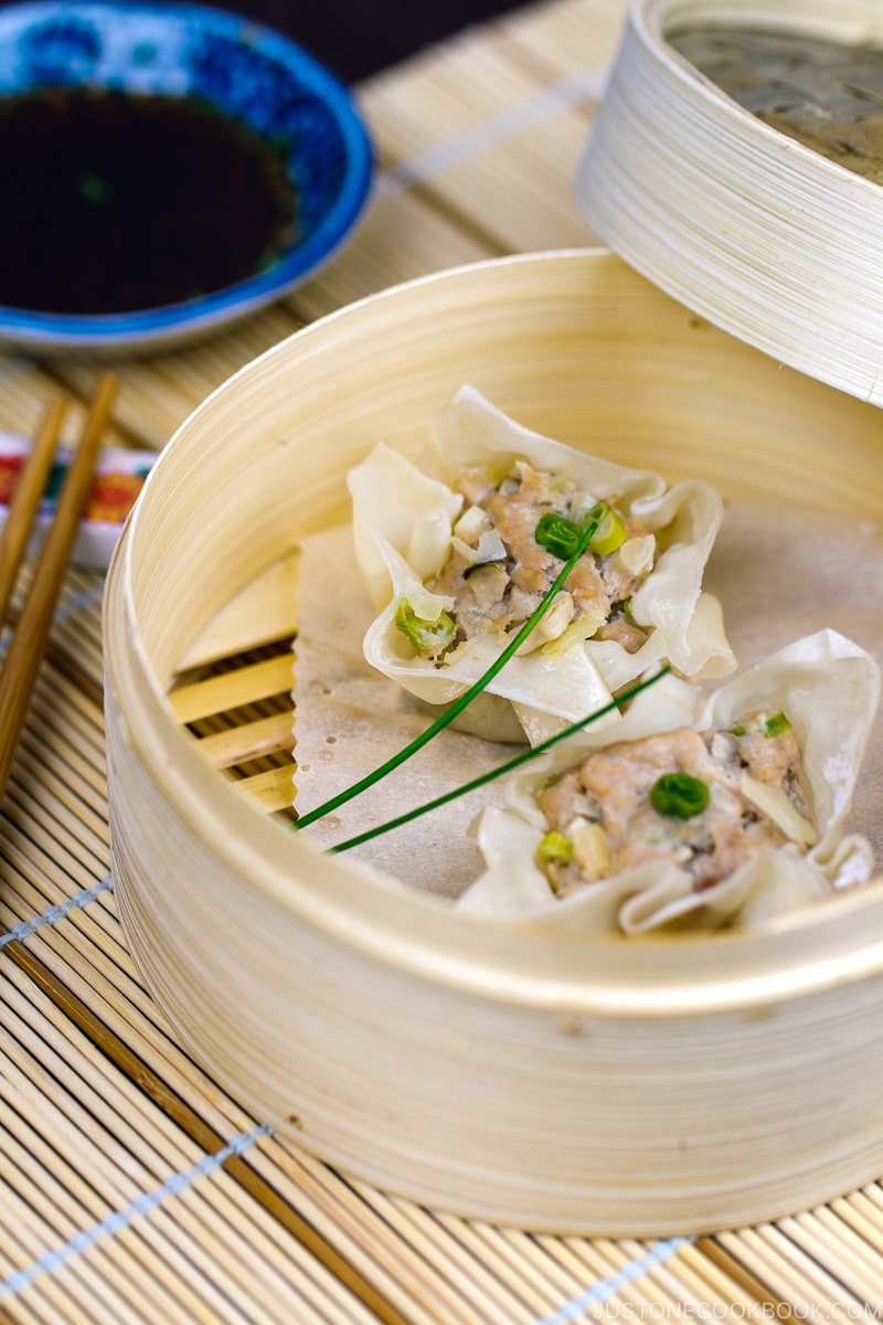 Shumai in a bamboo steam basket.