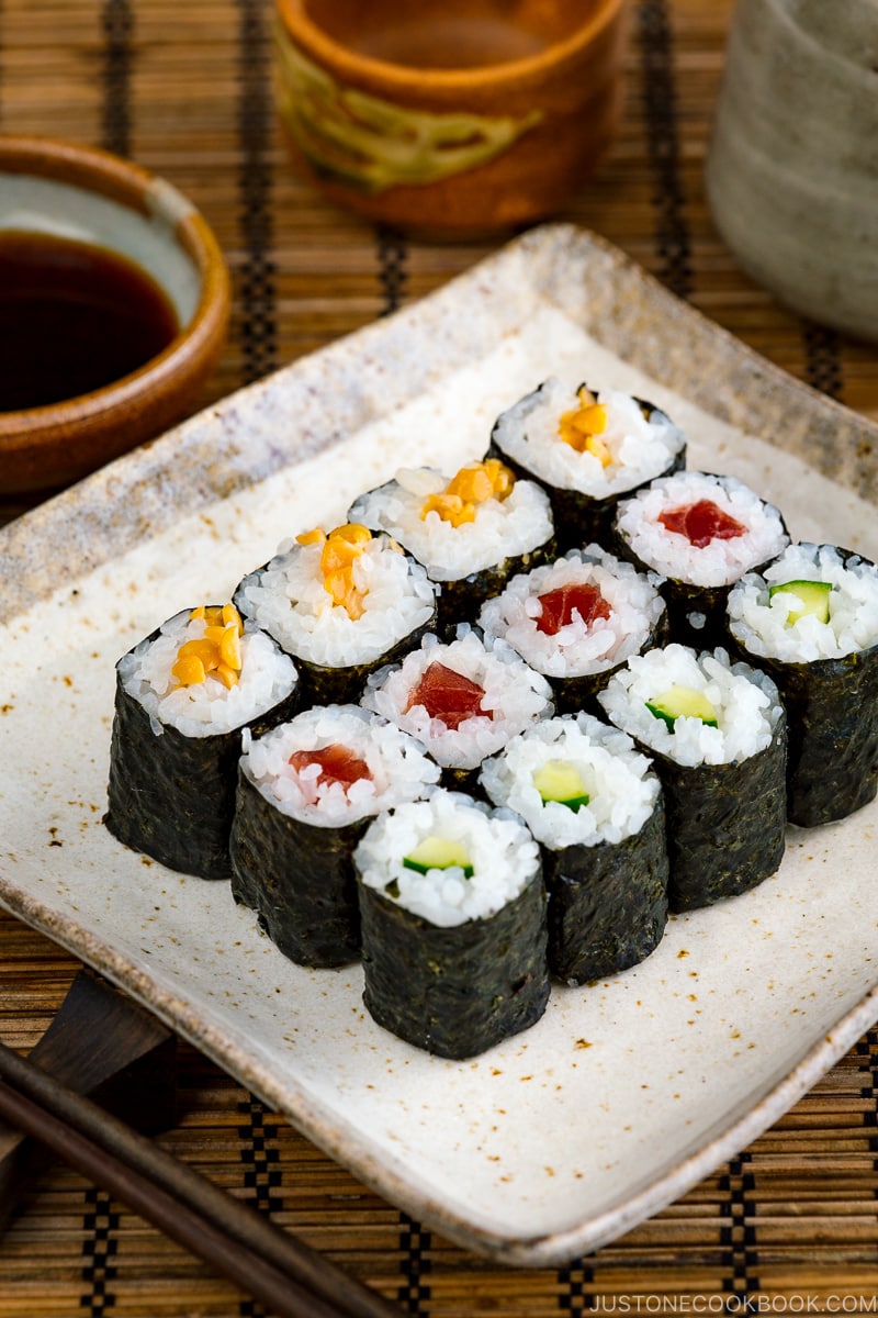 Assorted Japanese sushi roll set on white background. Sushi menu