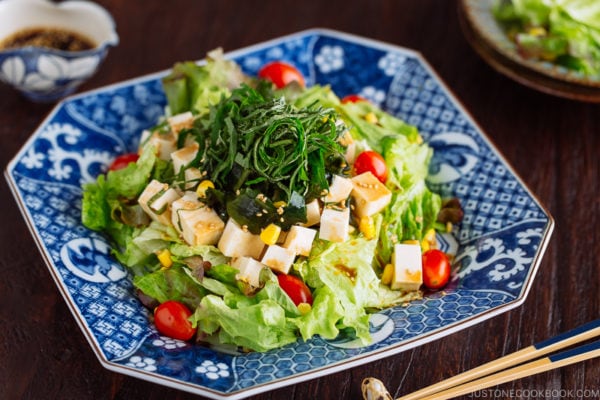 Refreshing Tofu Salad with Sesame Ponzu Dressing on a Japanese blue platter.