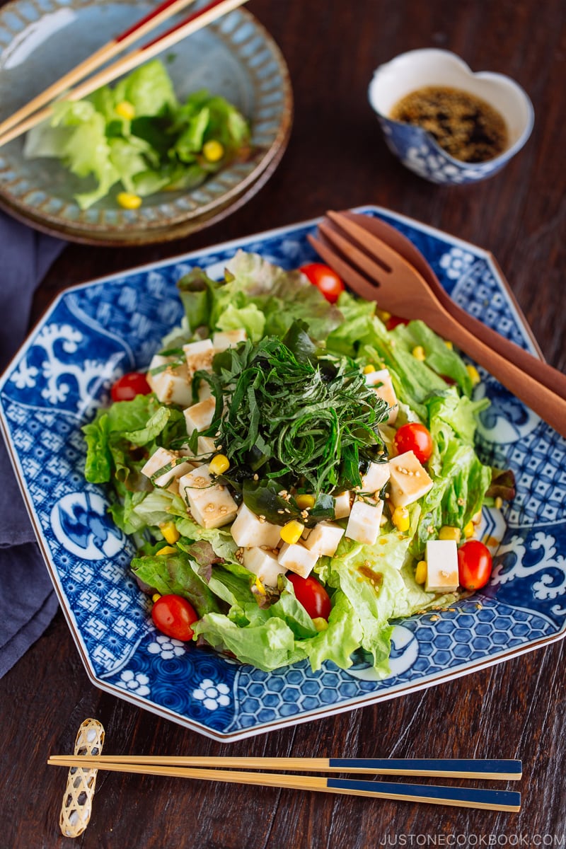 Refreshing Tofu Salad with Sesame Ponzu Dressing on a Japanese blue platter.