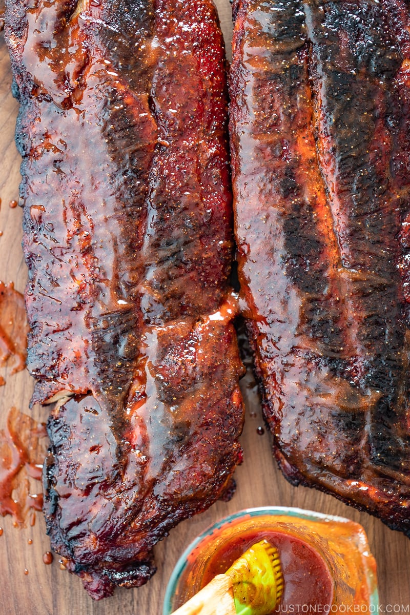 Smoked baby back ribs with bbq sauce.