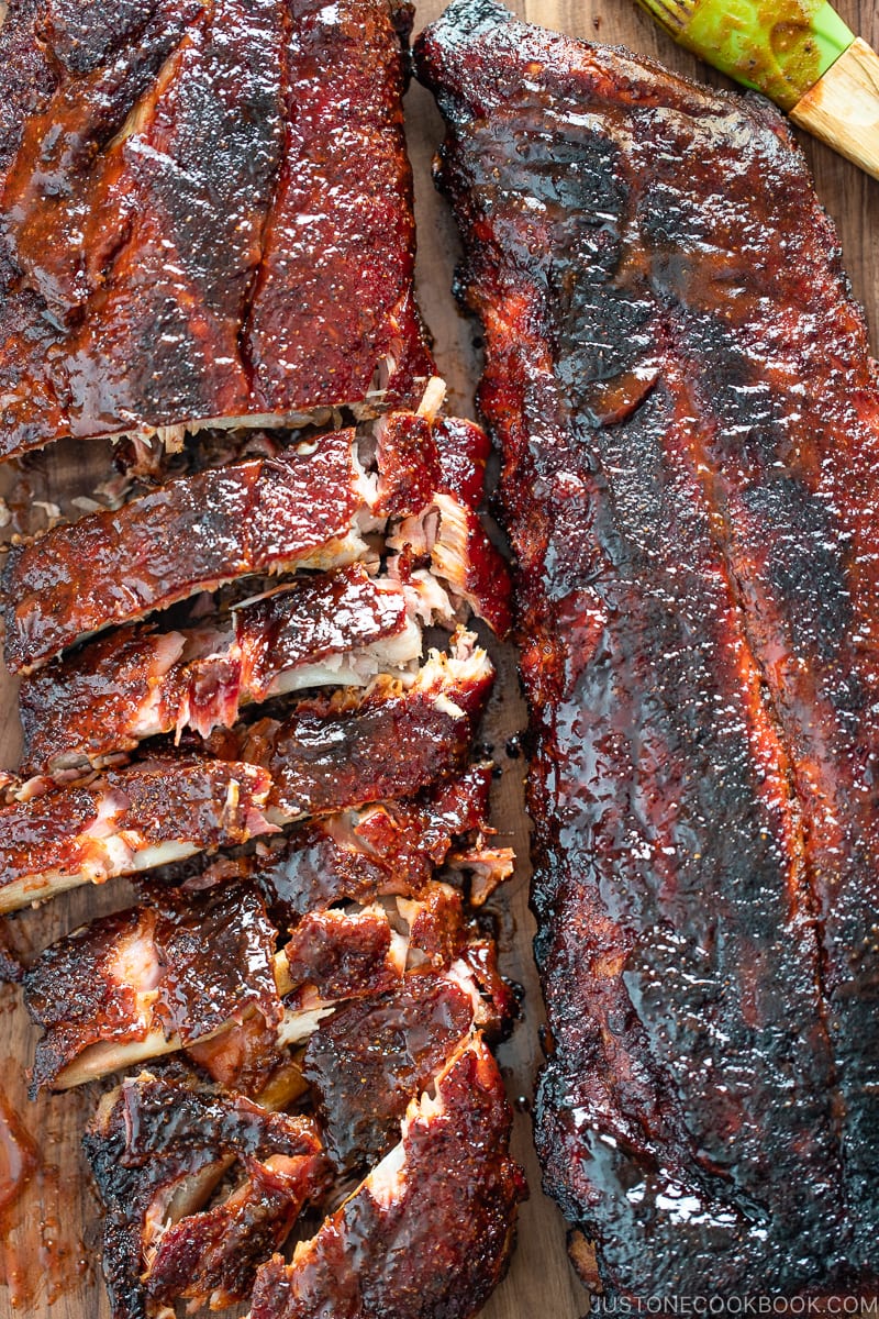 Smoked baby back ribs with bbq sauce.