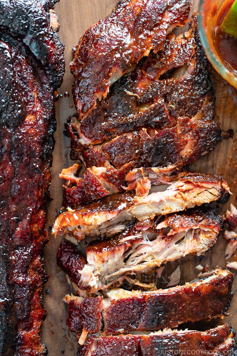 Smoked baby back ribs with bbq sauce.