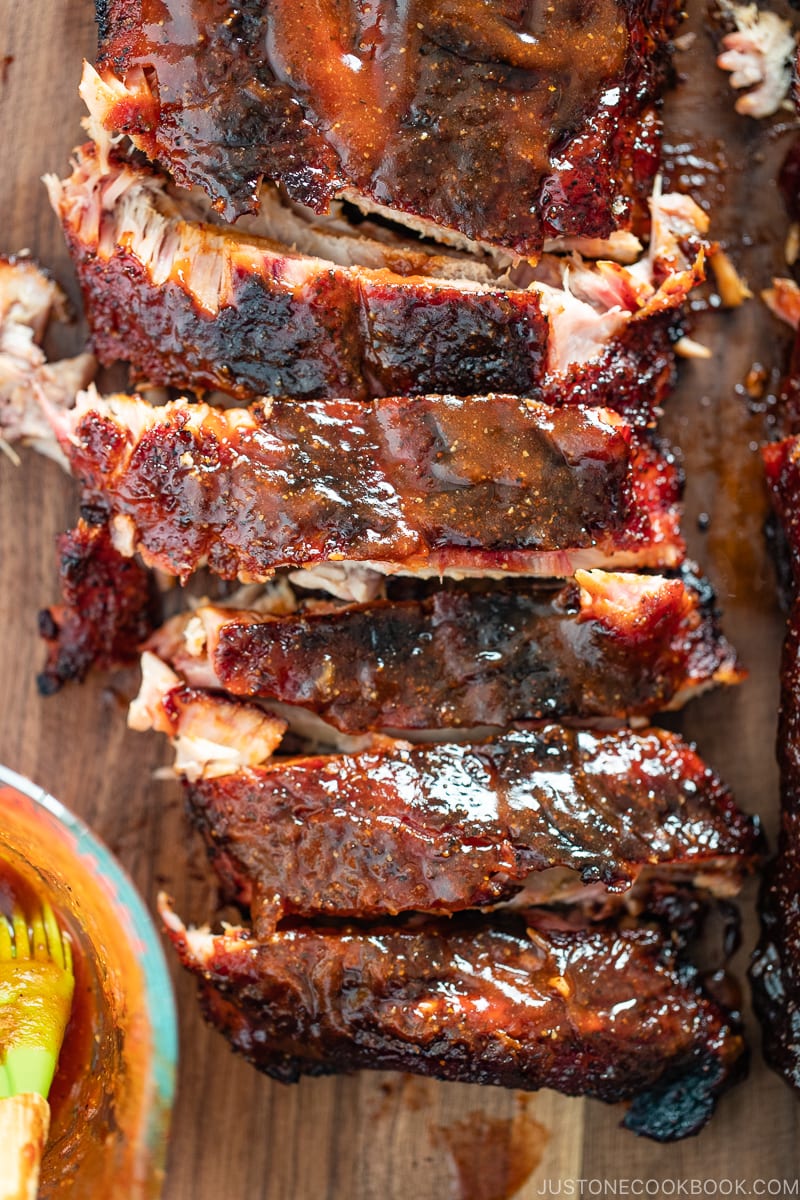 Smoked baby back ribs with bbq sauce.