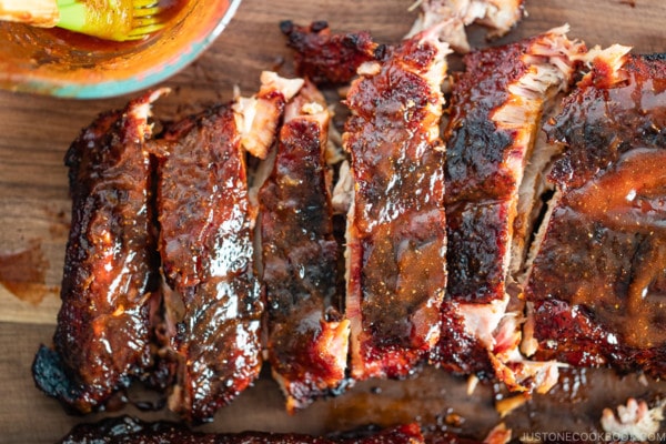 Smoked baby back ribs with bbq sauce.
