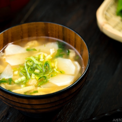 Three kinds of vegetable miso soups; each served in a Japanese wooden bowl.