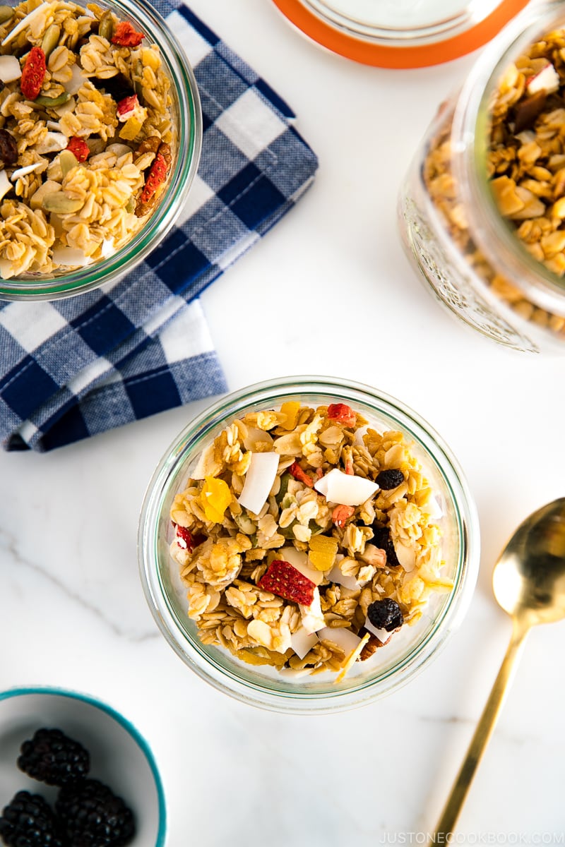 Mason jars and Weck jars containing homemade granola.