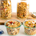 Mason jars and Weck jars containing homemade granola.