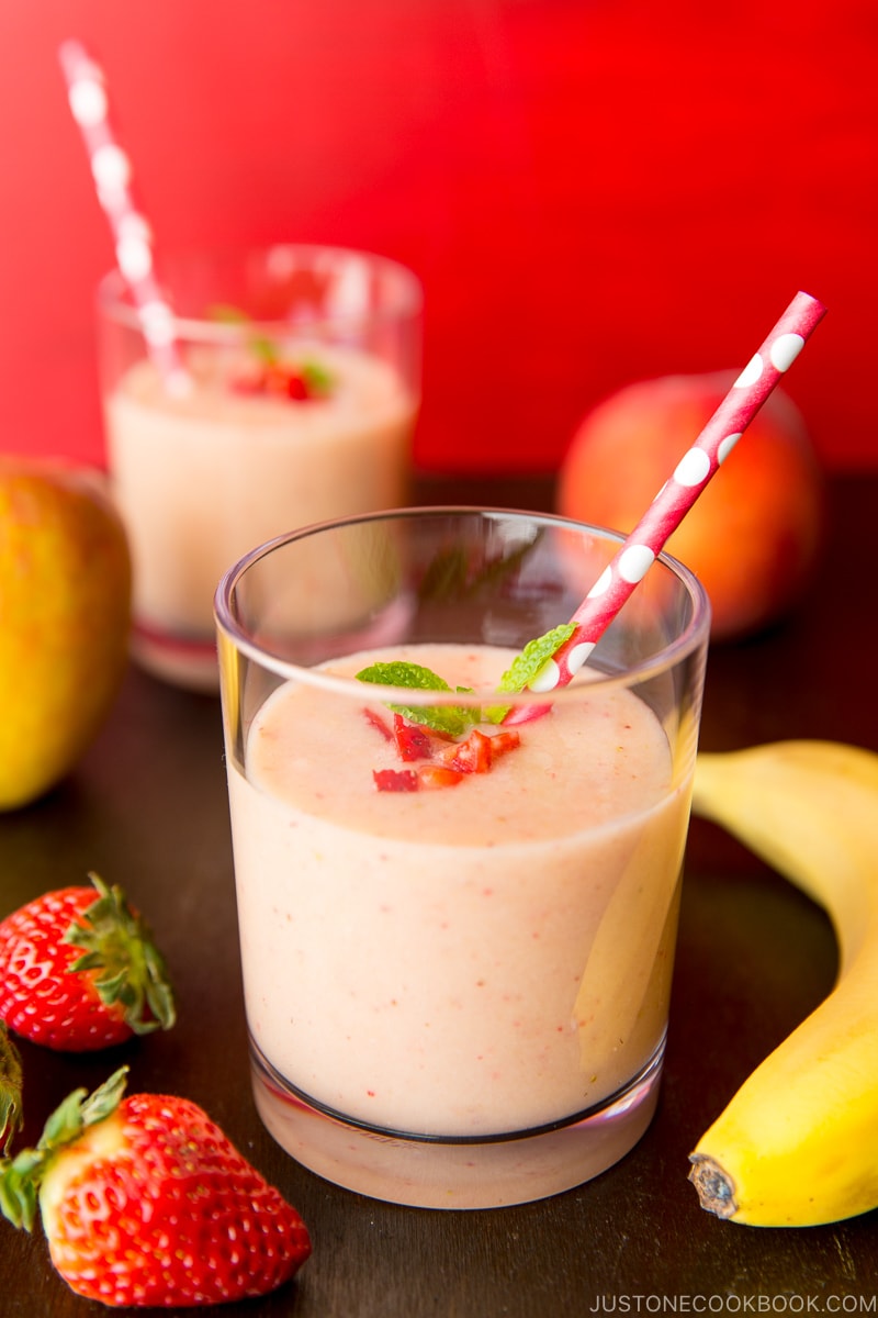 Strawberry banana smoothie in a glass.