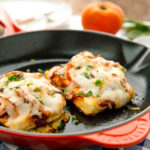 A cast iron skillet containing Tofu Pizza.