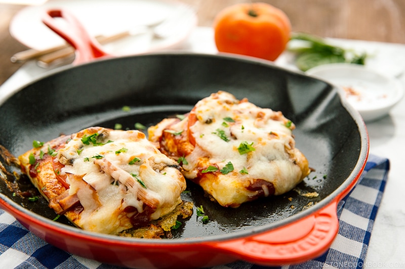 A cast iron skillet containing Tofu Pizza.