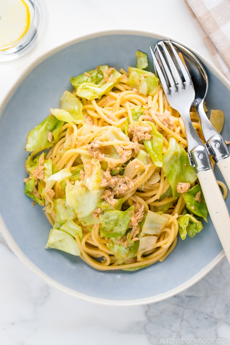 A blue plate containing Japanese-style Tuna and Cabbage Pasta.