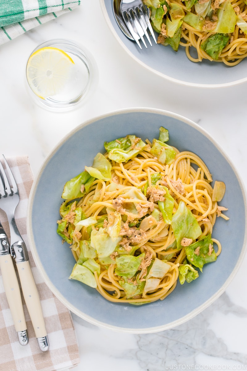 A blue plate containing Japanese-style Tuna and Cabbage Pasta.