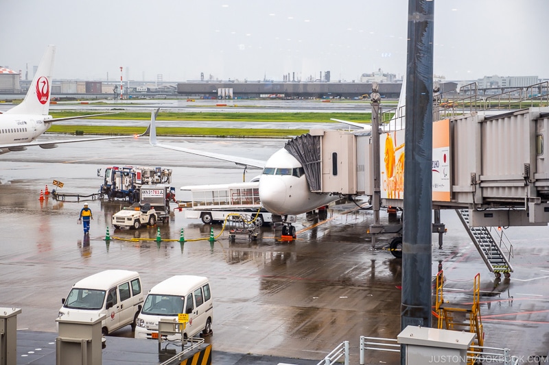 plane on tarmac at Haneda Airport - Yakushima Travel Guide | www.justonecookbook.com 