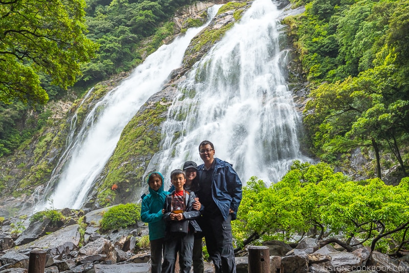 family standing in front of Ohko Waterfall - Yakushima Travel Guide | www.justonecookbook.com 