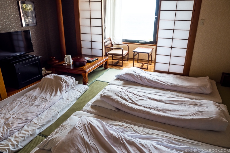 guest room with futon beds Seaside Hotel Yakushima - Yakushima Travel Guide | www.justonecookbook.com