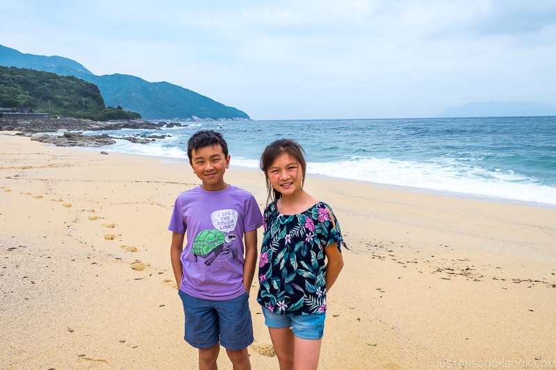 boy and girl at Inakahama Beach - Yakushima Travel Guide | www.justonecookbook.com