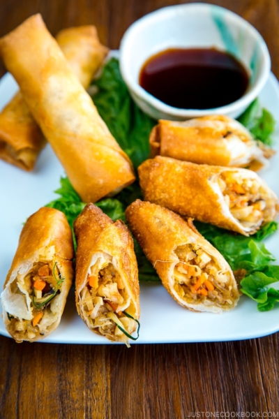 White plates containing Harumaki (Japanese spring roll).