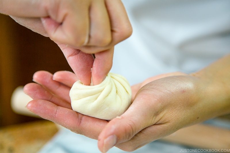 Folding the dumplings.