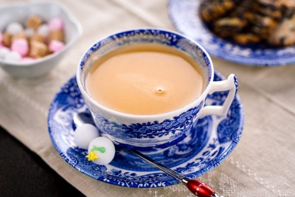 Royal milk tea in a blue and white tea cup.