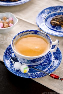 Royal milk tea in a blue and white tea cup.