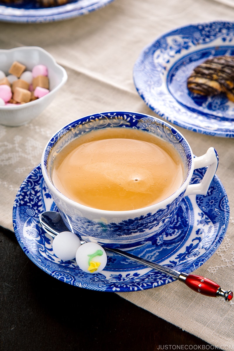 Royal milk tea in a blue and white teacup.