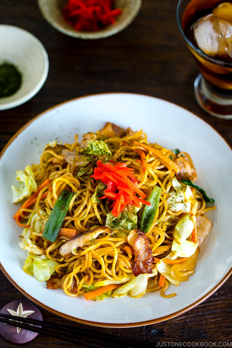 A white plate containing Yakisoba (Japanese Stir Fry Noodles).