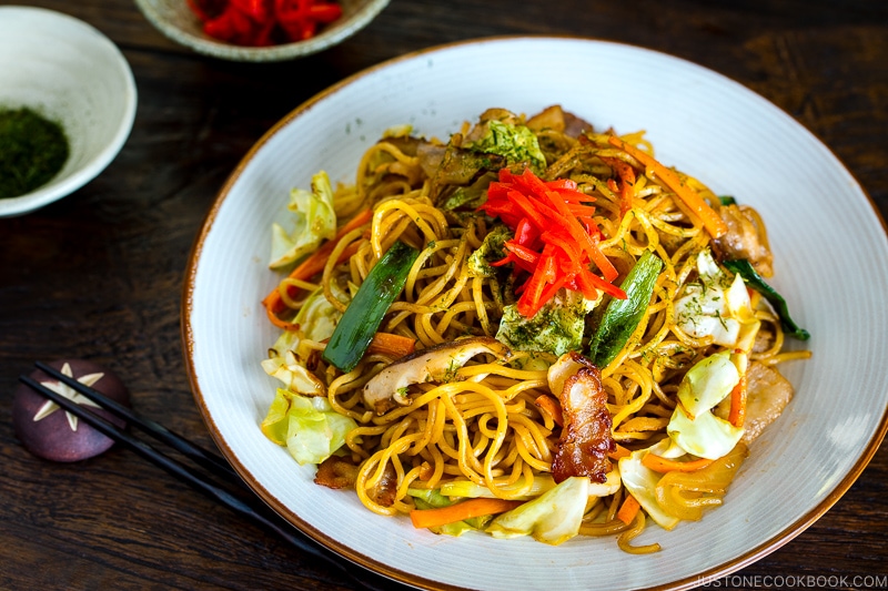 A white plate containing Yakisoba (Japanese Stir Fry Noodles).