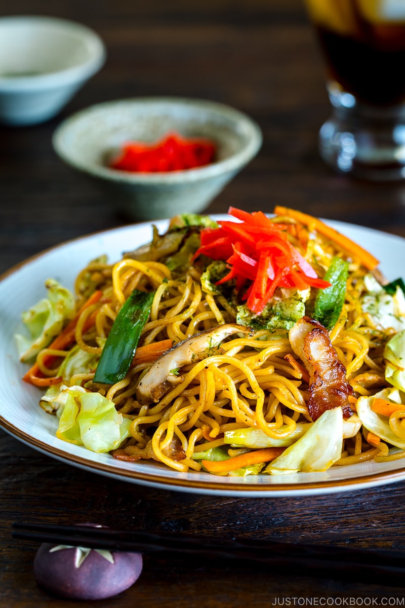 A white plate containing Yakisoba (Japanese Stir Fry Noodles).