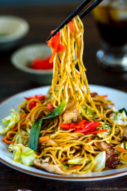 A white plate containing Yakisoba (Japanese Stir Fry Noodles).