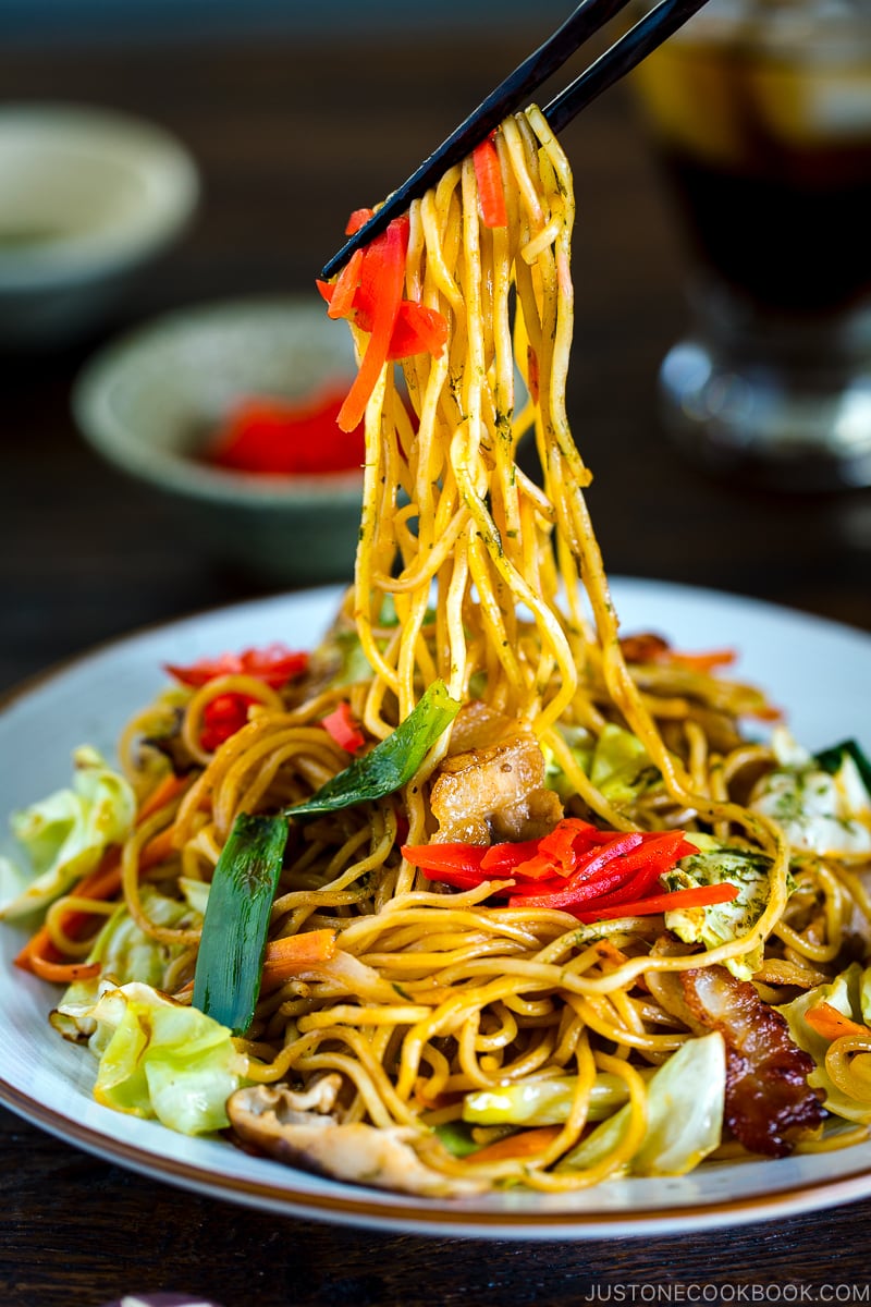 A white plate containing Yakisoba (Japanese Stir Fry Noodles).