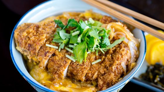 A donburi bowl containing baked katsudon.