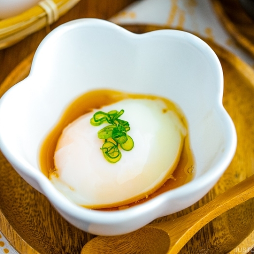 Onsen Tamago in a flower-shaped bowl.