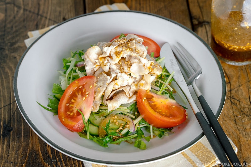 A white dish containing Shabu Shabu Salad.