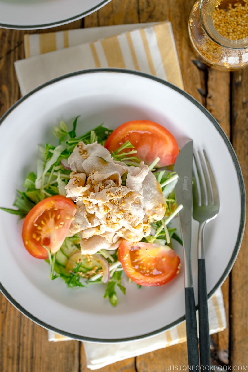 A white dish containing Shabu Shabu Salad.