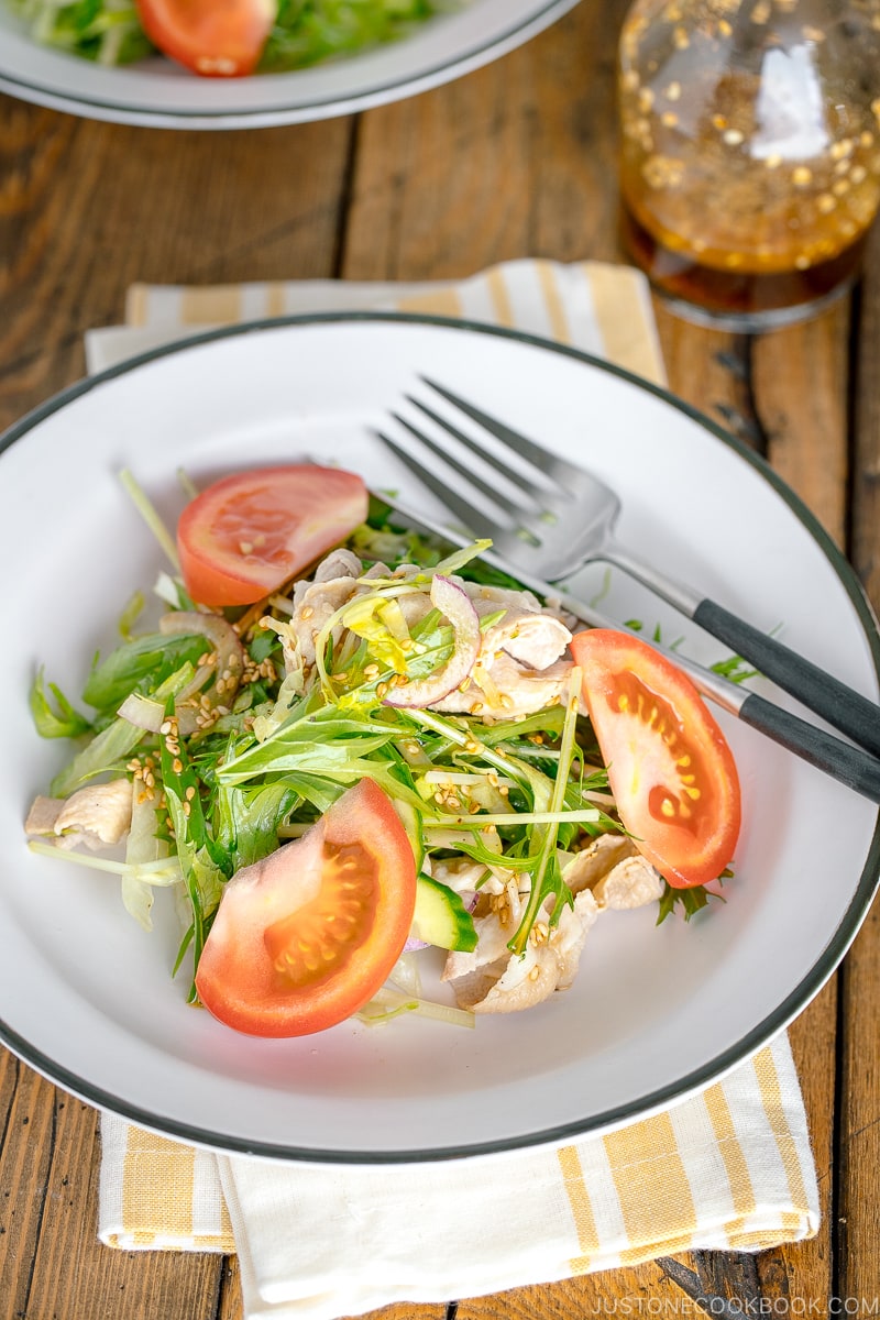 A white dish containing Shabu Shabu Salad.