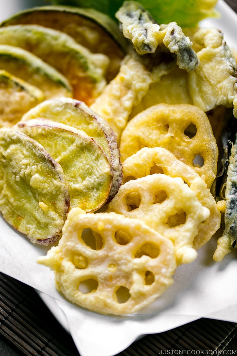 A plate containing assorted vegetable tempura.