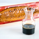 Unagi sauce in a glass bottle.