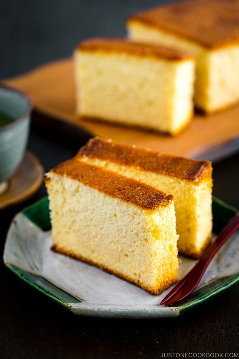 Two slices of Castella (Honey Cake) served on a plate.