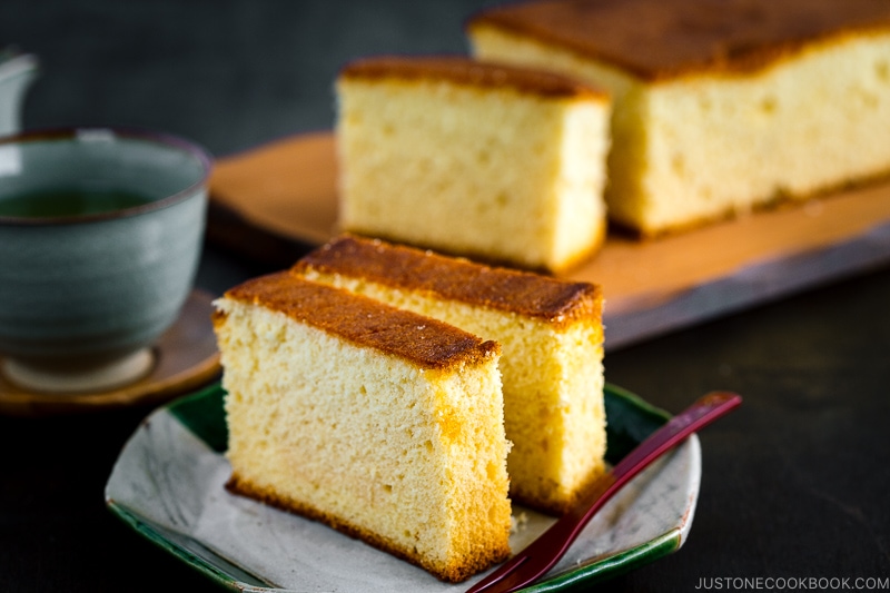 Two slices of Castella (Honey Cake) served on a plate.
