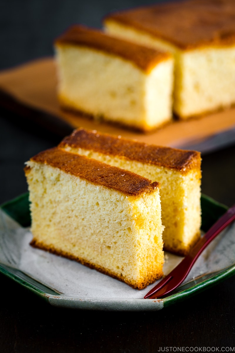 Two slices of Castella (Honey Cake) served on a plate.