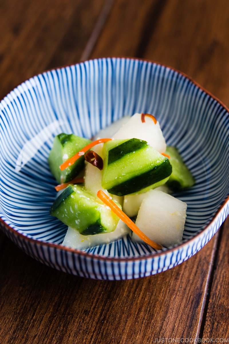 A Japanese ceramic bowl containing Daikon and Cucumber Salad with Shio Koji.