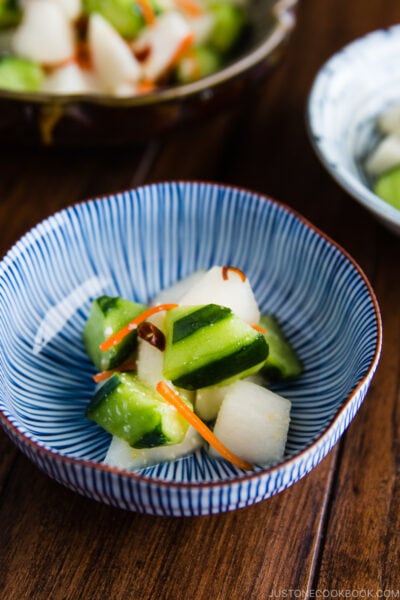 A Japanese ceramic bowl containing Daikon and Cucumber Salad with Shio Koji.