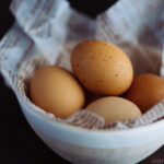 a white bowl containing pasteurized eggs.