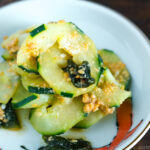 A small dish containing Spiralized Cucumber Salad.