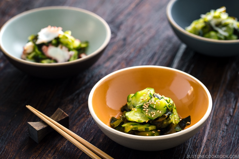 4 kinds of Sunomono (Japanese Cucumber Salad) in bowls..